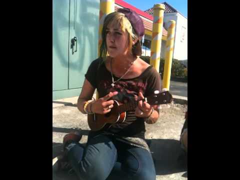 Young girl is an old soul on an ukulele.