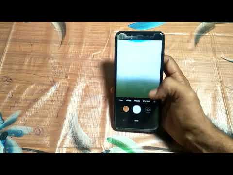 how to turn off mirror front camera mi A1