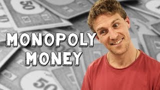 Using fake money to buy things Monopoly Money