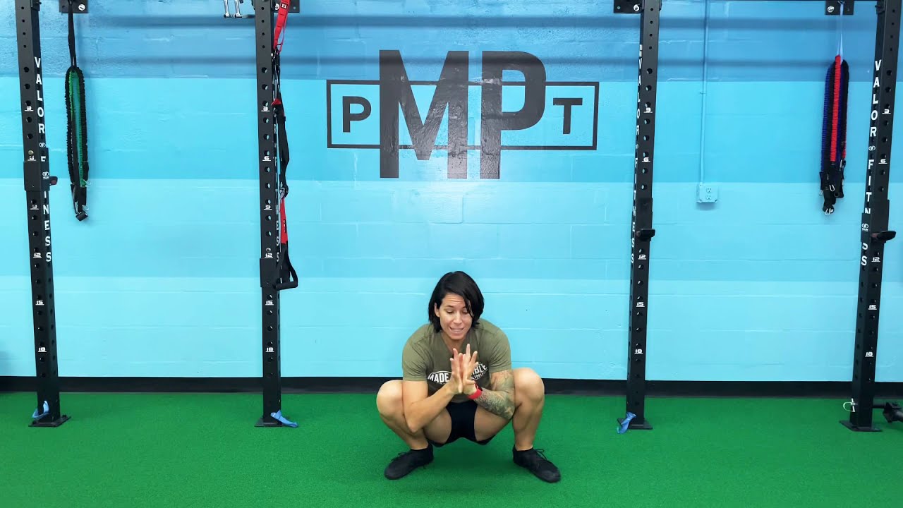 Sumo Squat Rocking Stretch