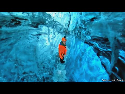 WALKING THROUGH AN GLOWING ICE CAVE
