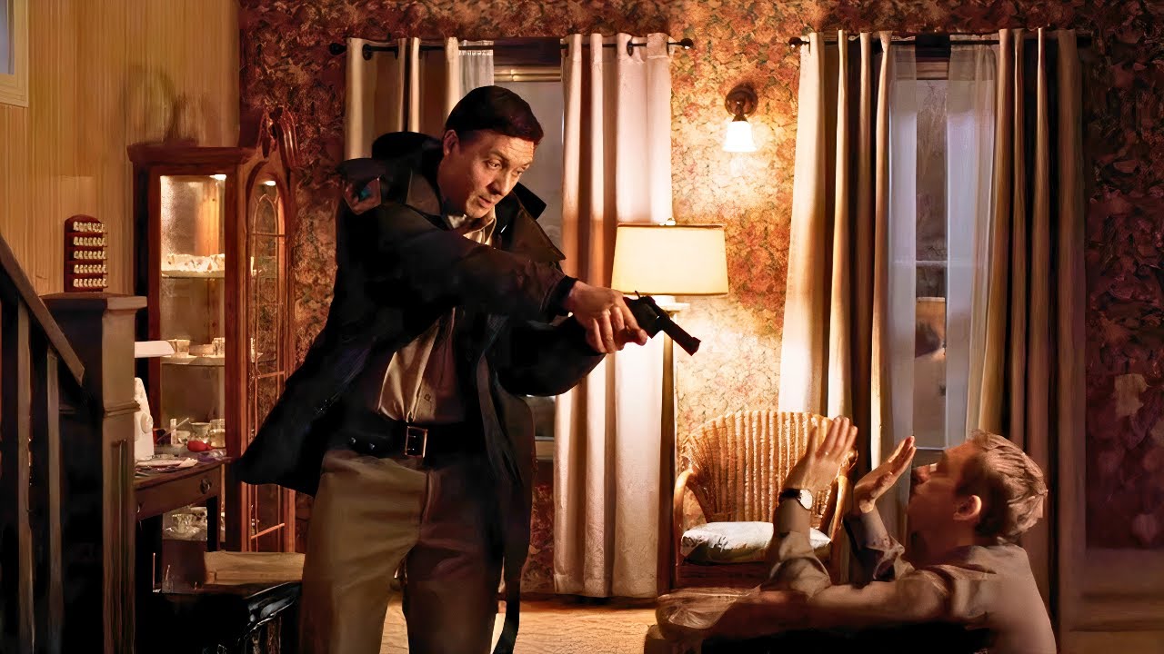 Corrupt cops mess with a weak-looking insurance guy, not knowing he's actually a total badass