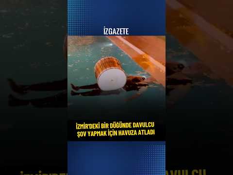 İzmir'deki bir düğünde davulcu, şov yapmak için havuza atladı #izmir #düğün #davulcu #havuz #haber