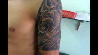 preview picture of video 'Tattoo can tho, xam nghe thuat can tho, thep tattoo_ca chep-hoa rong'