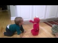 Paityn Watching Tickel Elmo And Garrett 122213