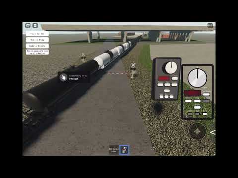 Union Pacific tanker train goes past a crossing