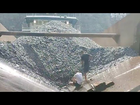 Barge unloads 4200 tons of cobblestone- my daily work on the barge