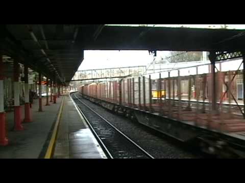 DRS 57012 6C19 Chirk - Carlisle empty logs and 92042 4M67 Mossend - Hams Hall 26/3/10