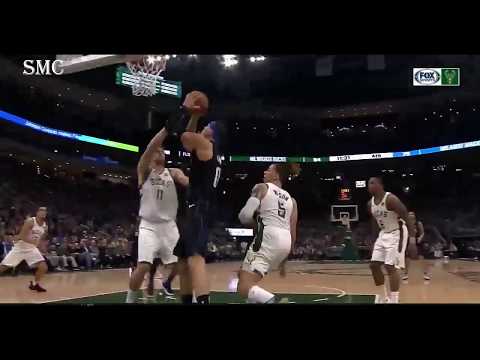 LOPEZ BROOK BRUTALLY BLOCKED AARON GORDON