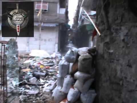 اشتباكات بين كتيبة شام الياسمين و قوات النظام في مخيم فلسطين في مدينة دمشق