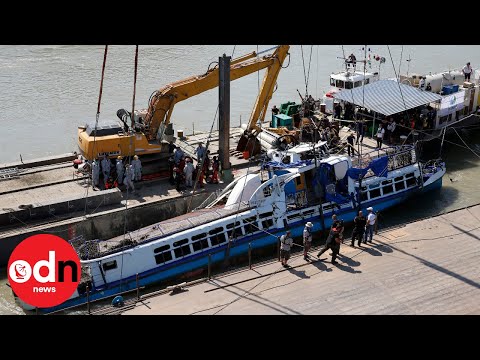 Timelapse of sunken tour boat raised from Danube River