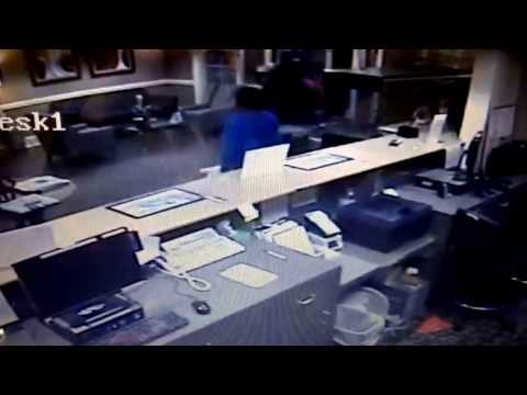 Thieves taking a candy bowl from hotel lobby.