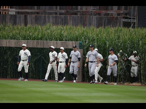 Kevin Costner leads the Yankees and White Sox out of the cornfield at MLB at Field of Dreams!