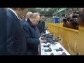 Vladimir Putin visits a Kalashnikov company
