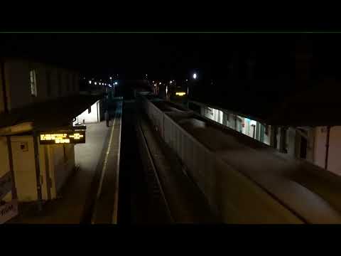 GBRf 60087 loco on stone freight train ex Penmaenmawr passing through Flint Station Wales 20.12.21