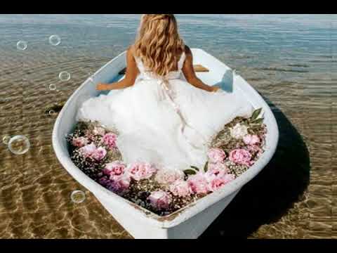 YOUNG  LADY  IN  A  BOAT  FULL  OF  FLOWERS  !