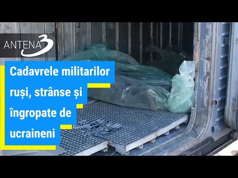 Cadavrele militarilor ruși, strânse și îngropate de ucraineni