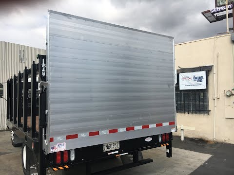 Tommy Gate Rail Lift installed by Mac's Lift Gate on Isuzu Stake