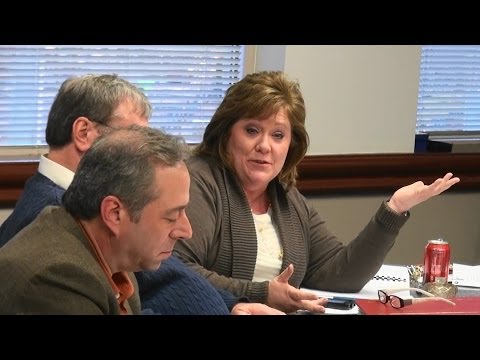 Forsyth County Commissioner Cindy Jones Mills consults outside counsel 12/10/13