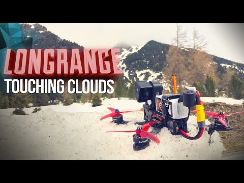 flight-through-clouds-on-a-mountain-peak--long-range-fpv-4k