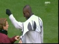 Mario Balotelli can't get his bib on