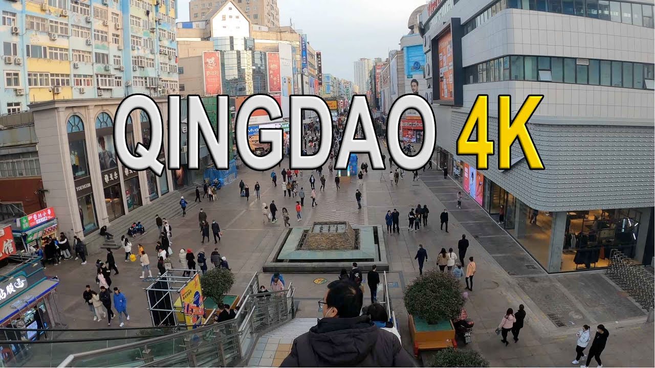 Immersive street-level walking tour through Qingdao Taidong, China, showcasing authentic urban landscapes, local architecture, and the vibrant atmosphere of the city's neighborhoods