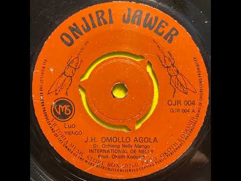J.H. Omollo Agola - International de Nelly