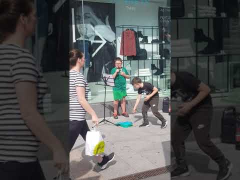 Amazing young lad in Tralee, Ireland singing