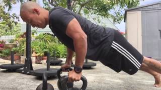 Try the Triple Kettlebell Push Up