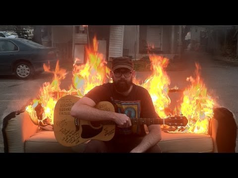 Playing Guitar on a Flaming Couch - Drew Danburry