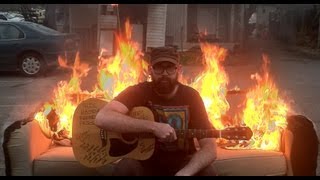 Playing Guitar on a Flaming Couch - Drew Danburry