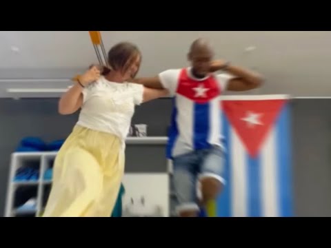 Spice Up Your Dance Moves: Mesmerizing Cuban Salsa Performance by Talented Couple!