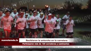Recibieron la antorcha en la carretera