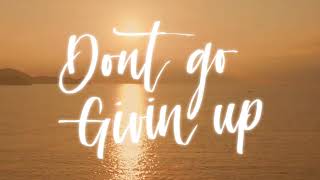 Agatino Romero - Don't Go Givin Up (ft. JRand) Lyric Video