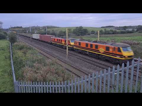 Class 90s head South at Floriston with a Mossend-Daventry train, 13-9-23.