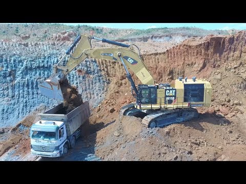 Caterpillar 6015B Excavator Loading Mercedes And Man Trucks Aerial View - Sotiriadis Brothers