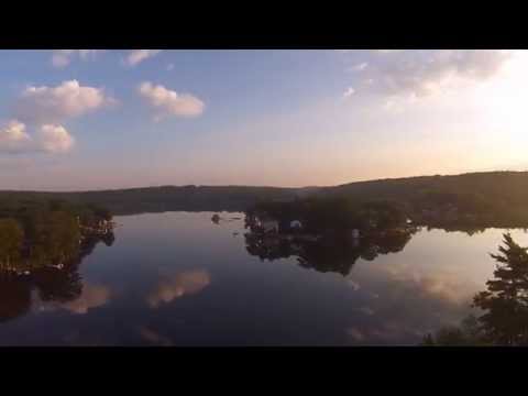 Aerial Drone Video of Mirror Reflection on Lake Maspenock Hopkinton MA