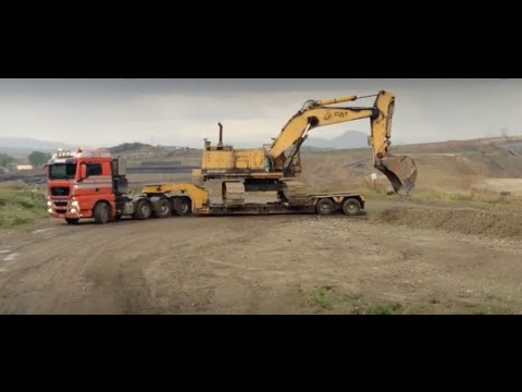 Transporting The Caterpillar 245B Excavator By Side - Fasoulas Heavy Transports