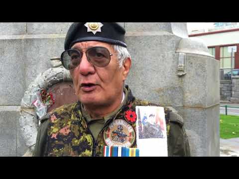 Veteran on guard at Victory Square