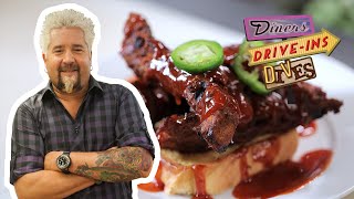 Guy Fieri Eats BBQ Smoked Alligator Ribs | Diners, Drive-Ins and Dives
