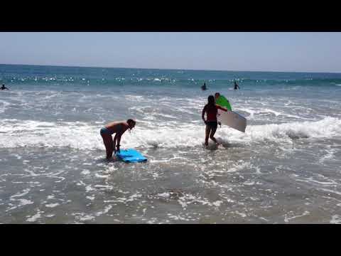 Boogie boarding at the beach
