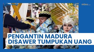 Viral Pasangan Pengantin Dikalungi Tumpukan Uang Kertas, Publik: Info Cowok Madura