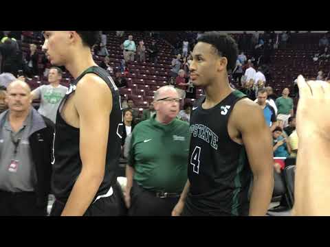 Frank Martin meets his son, Brandon, after South Carolina beats USC Upstate