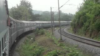 preview picture of video 'Kerala Express In The Scenic Wadakenchery Ghat Section'