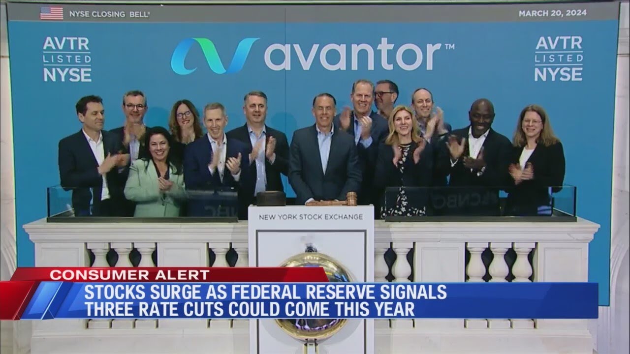 Stocks surge as Federal Reserve signals three rate cuts could come this year