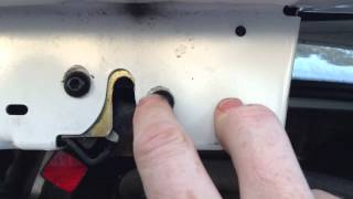 How to adjust the trunk latch on a car - Ford Focus