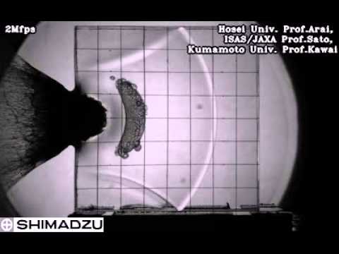 High Speed Collision of a Transparent Laminate with a Resin Sphere