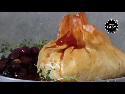 Bake a whole Camembert in crispy phyllo pastry with honey-roasted grapes. You’ll thank us later.
