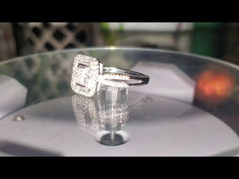 sold. 0.44 carat diamond cluster ring. 10 k gold. Appraised CAD 2.400