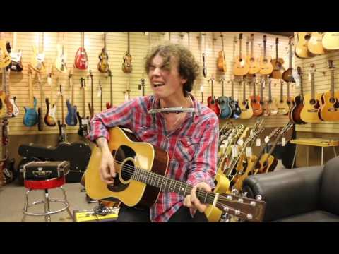 Conor Coughlan playing a Rosewood 1969 Martin D-28 at Norman's Rare Guitars